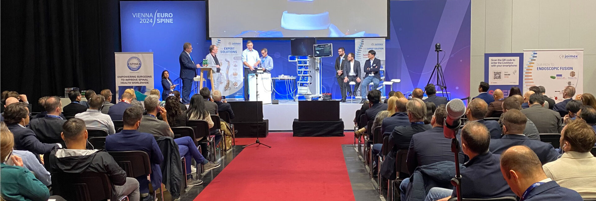 Expert talk at the Joimax booth at Eurospine 2024 in Vienna.