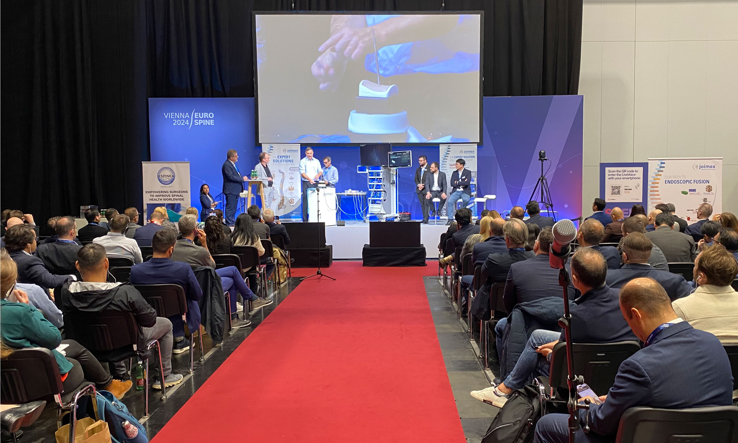 Expert talk at the Joimax booth at Eurospine 2024 in Vienna.