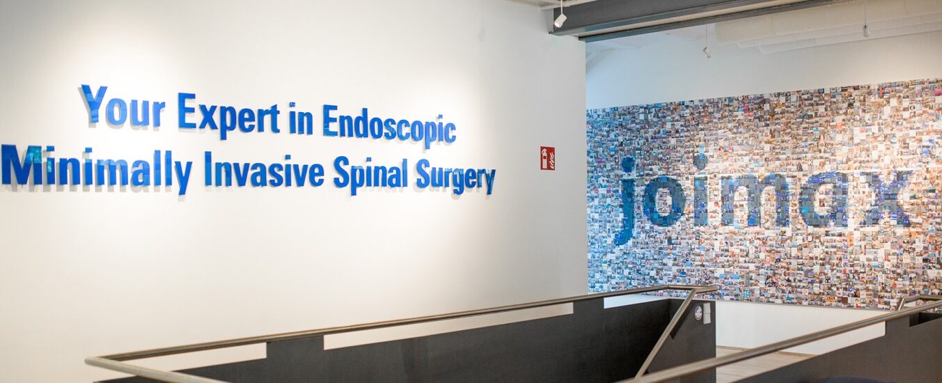 joimax Office Pictures with the slogan on the left wall "Your Expert in Endoscopic Minimally Invasive Spinal Surgery"